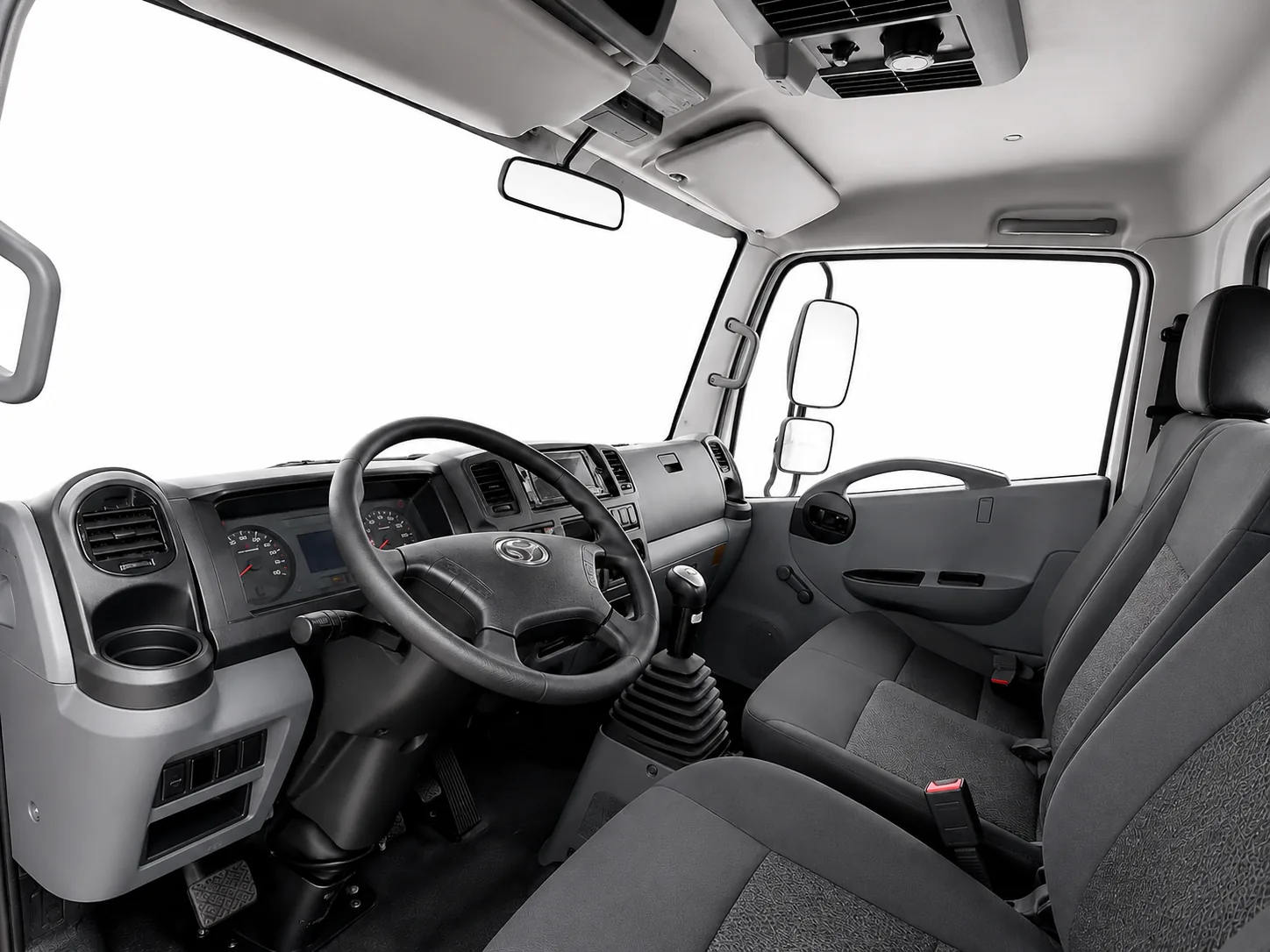 Volquete F2 Plus, interior de cabina